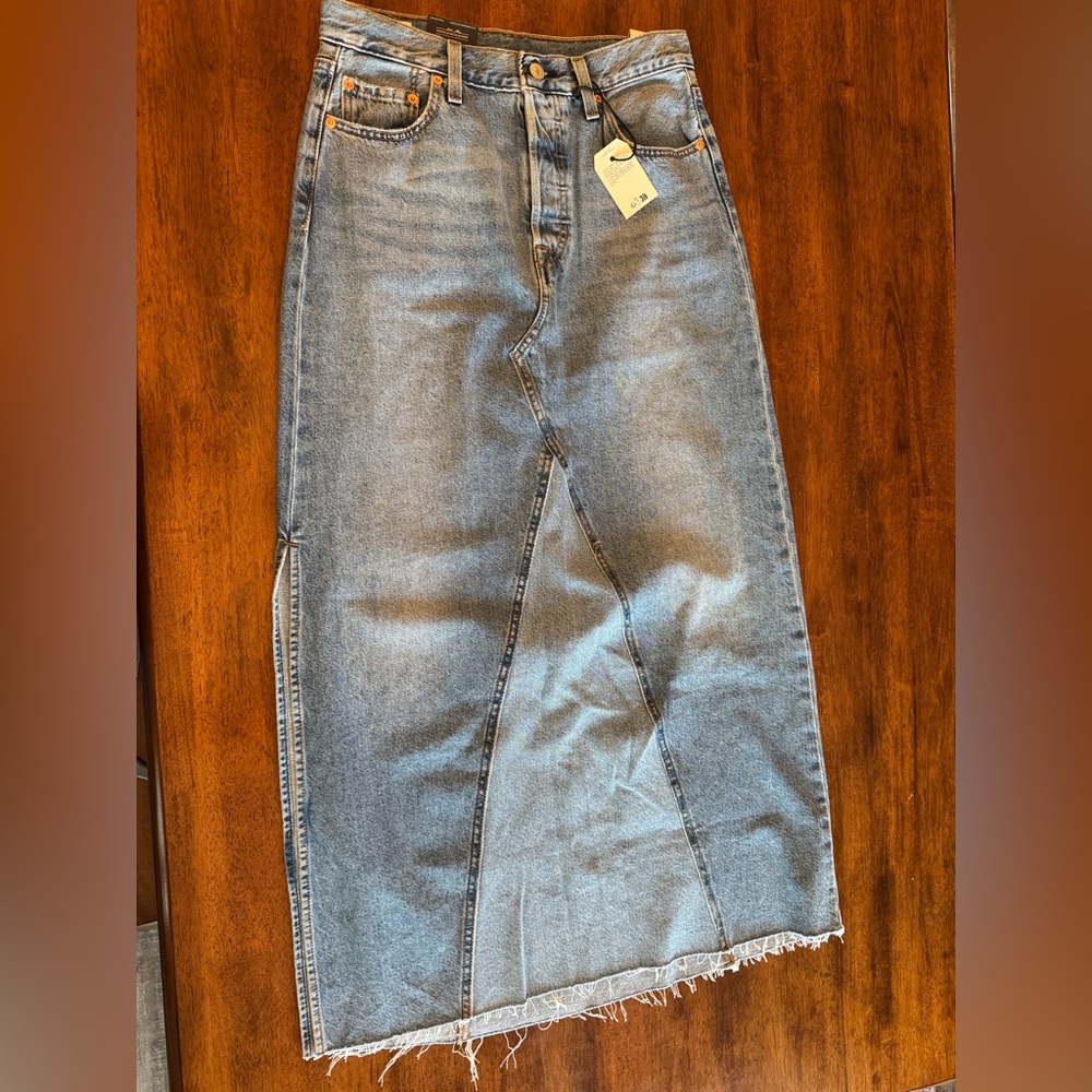 Brand new long jean Levi skirt.  Tags attached.  Size 29